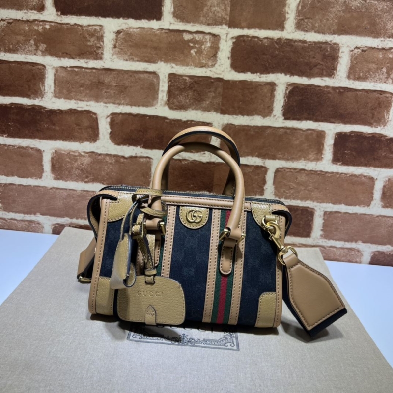 G*u*i top handle bags